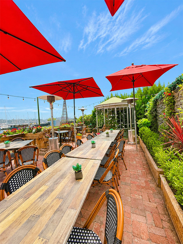 Outdoor banquet dining at Salito’s Crab House with scenic ocean views.